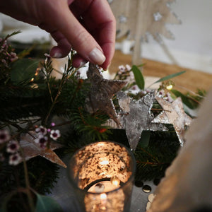 Metallic tealight holder on Christmas table