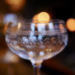 Load image into Gallery viewer, Vintage-style etched champagne coupes Dress For Dinner
