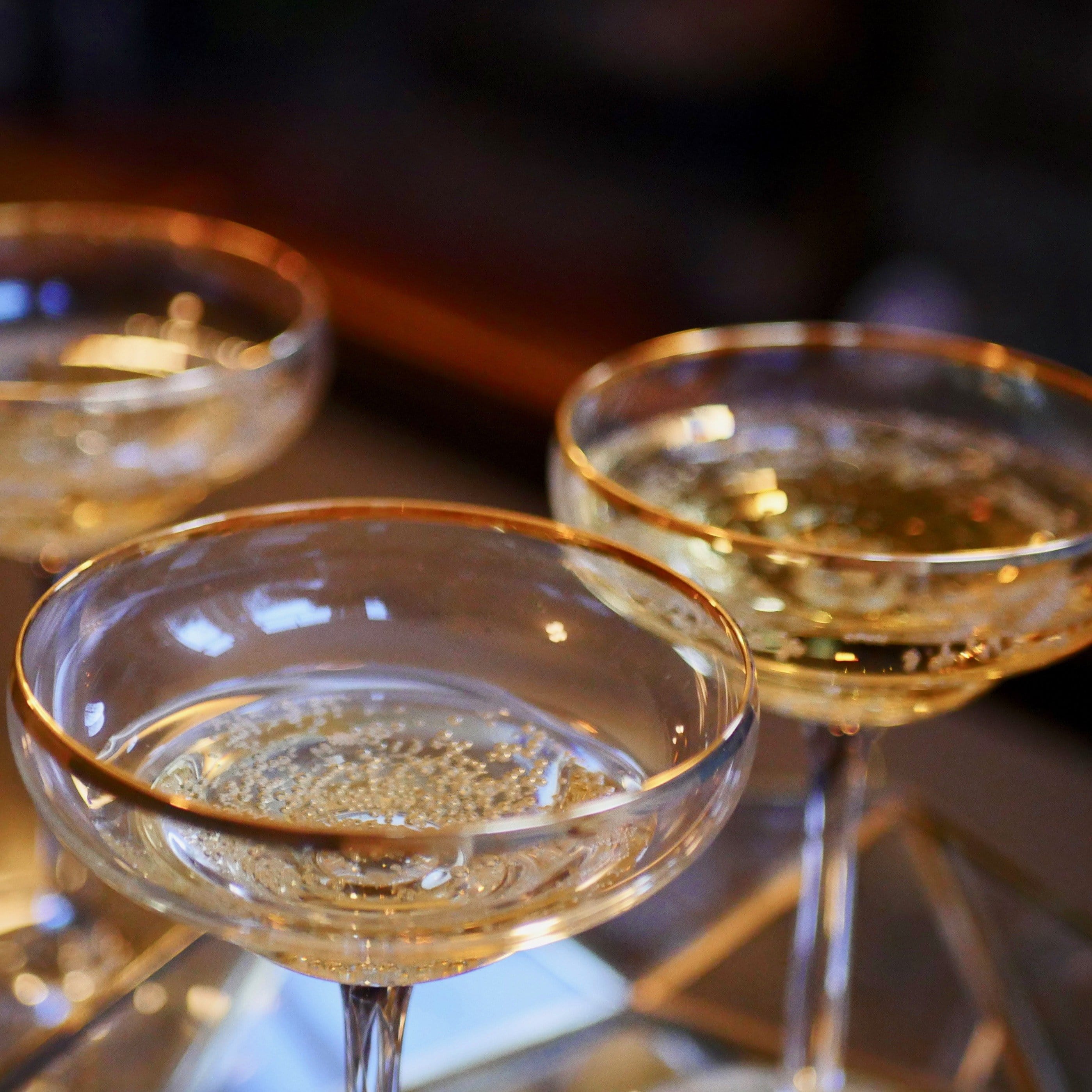 gold rimmed champagne coupes