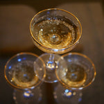 Load image into Gallery viewer, Gold rimmed champagne glasses
