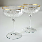 Load image into Gallery viewer, Gold rimmed vintage champagne glasses
