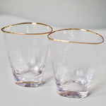 Load image into Gallery viewer, Pair of gold-rimmed tumblers 

