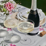 Load image into Gallery viewer, Retro Ribbed Champagne Coupes with Gusbourne English Sparkling Wine
