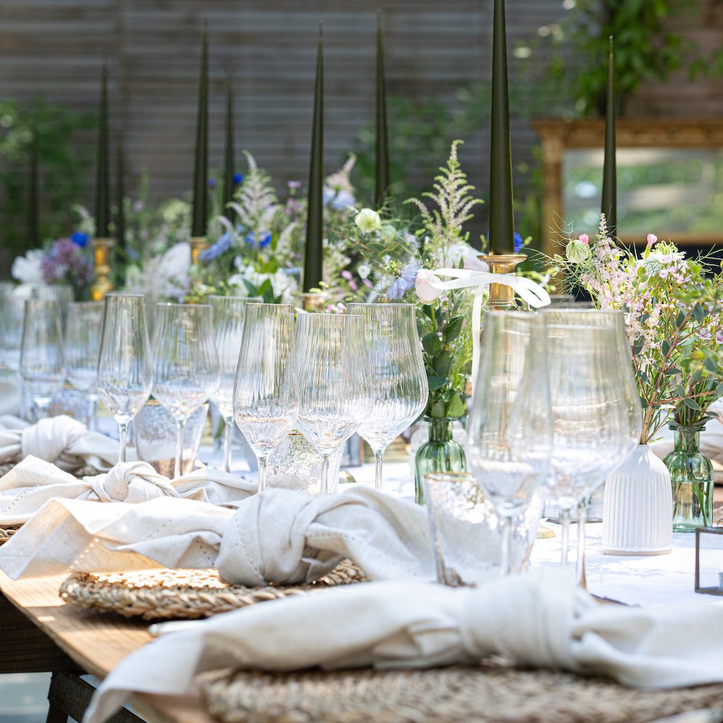 Fluted wine glasses on wedding tablescape