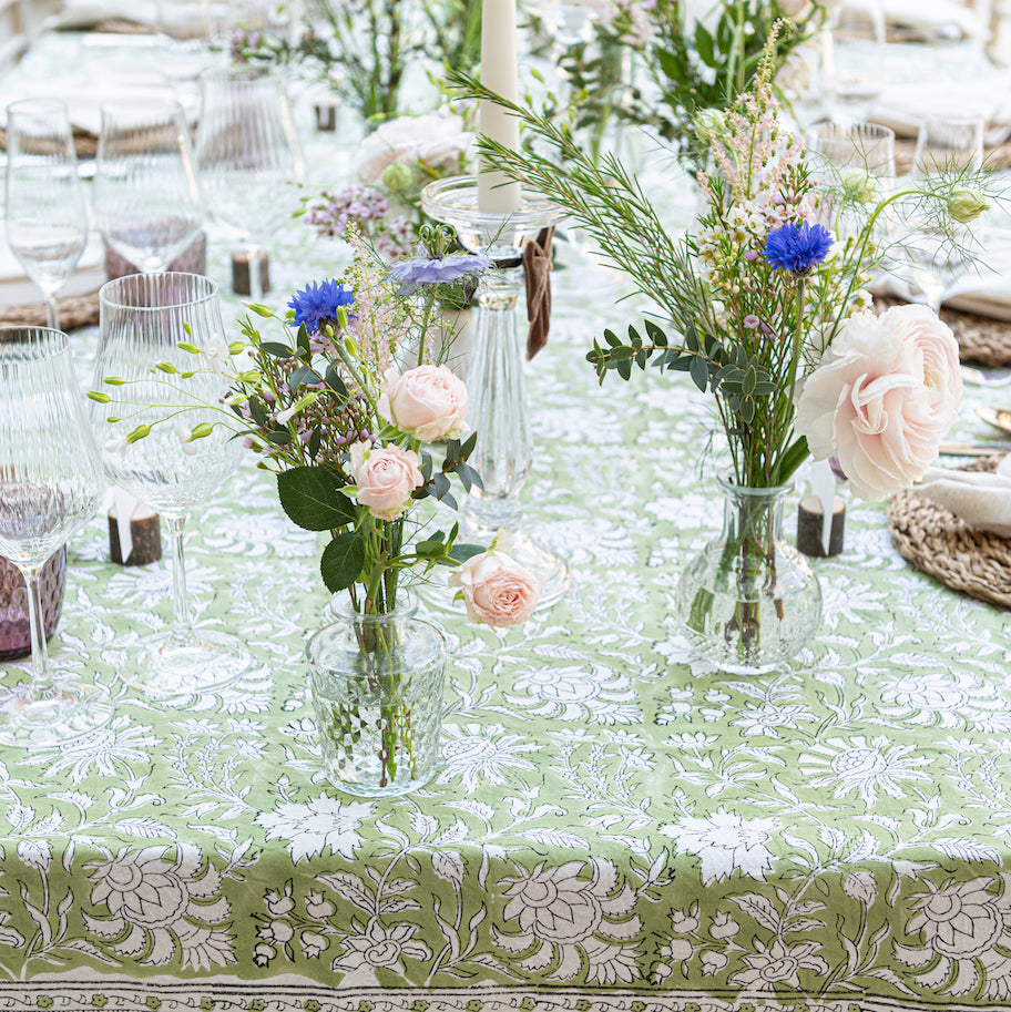 green floral tablecloth for wedding tablescape hire