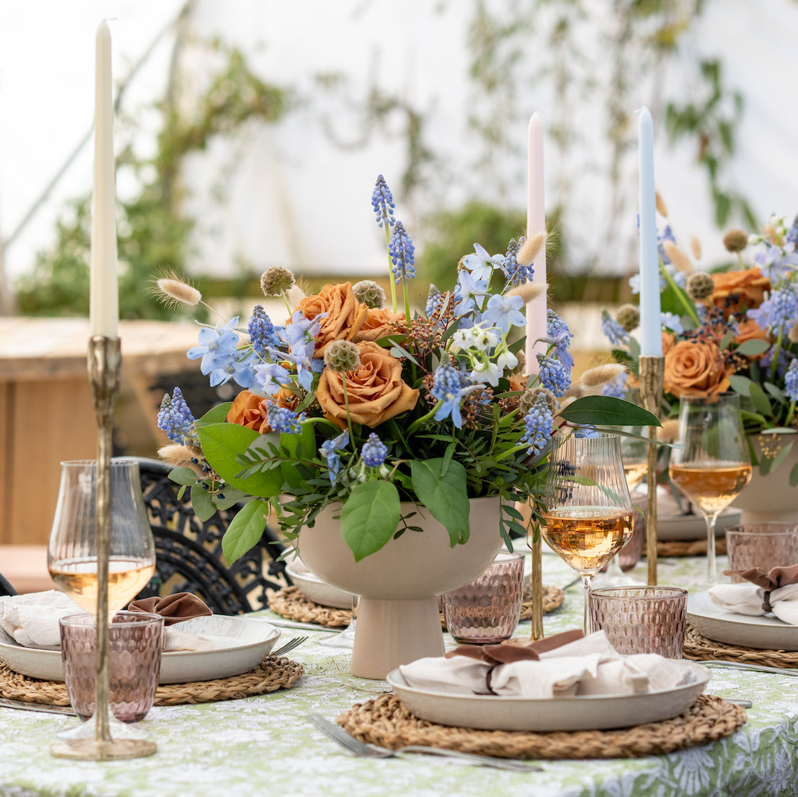 Gold candlesticks and pastel candles 