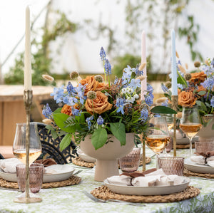 Gold candlesticks and pastel candles 