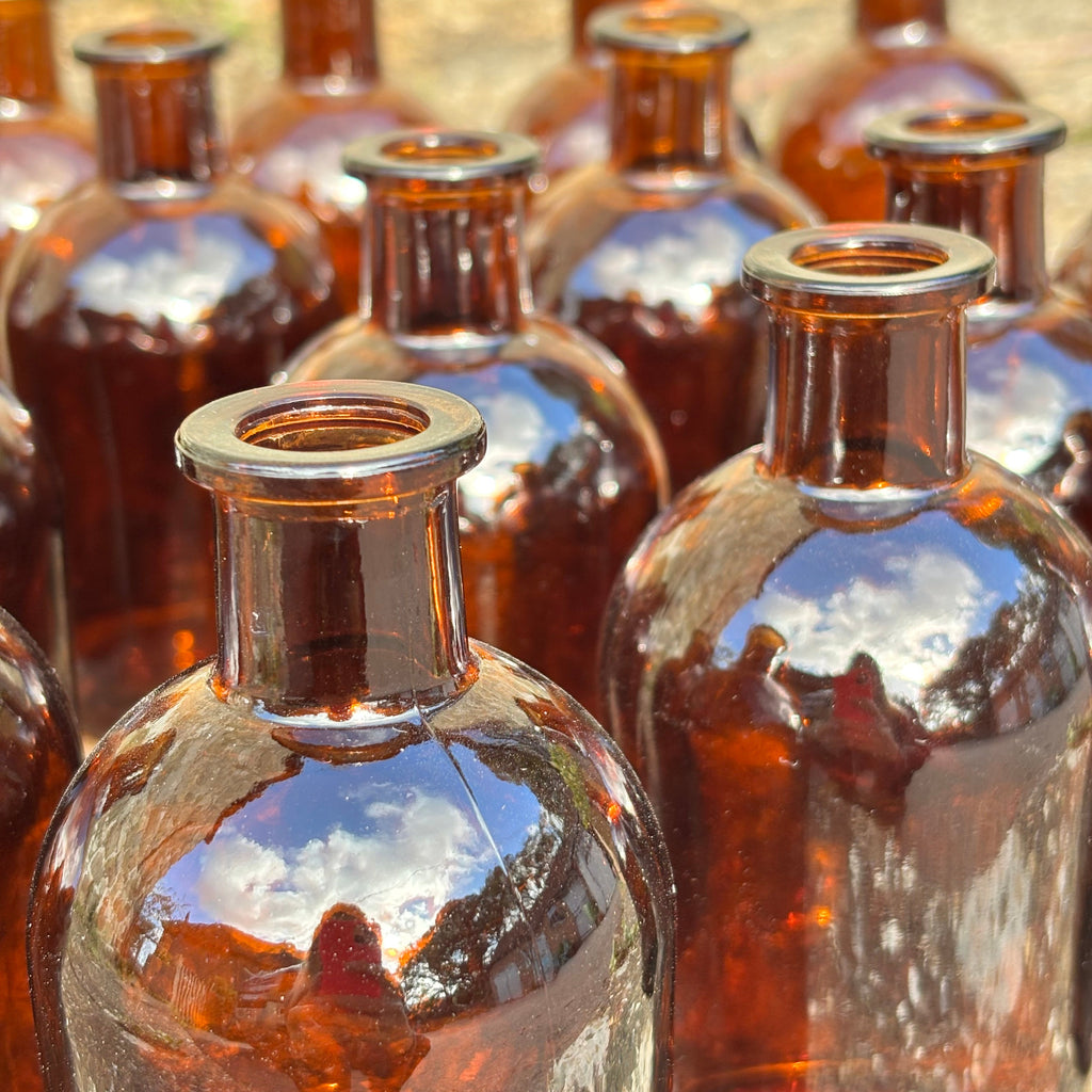 Amber bud vases for wedding tables 