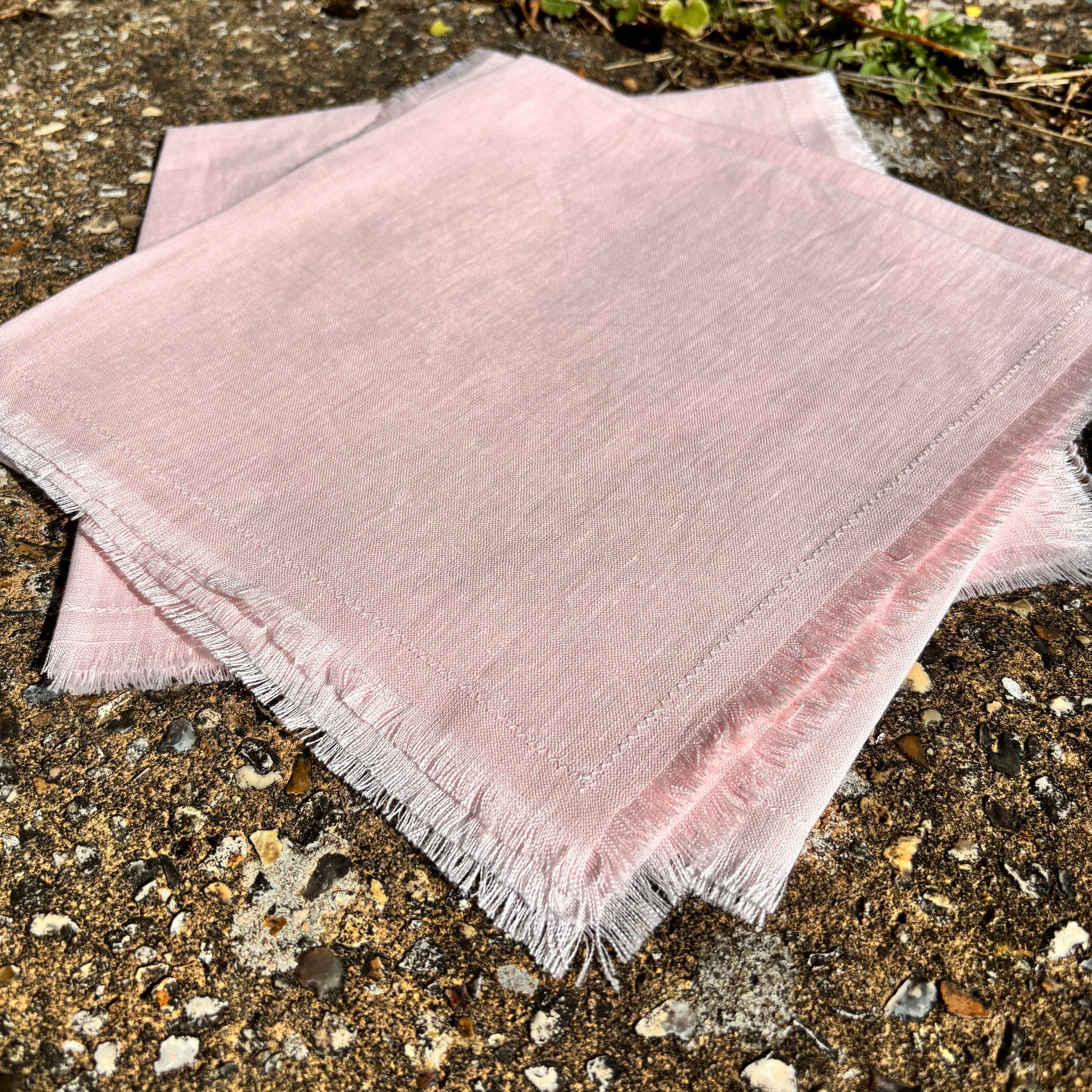 blush pink fringed napkins for wedding tableware hire