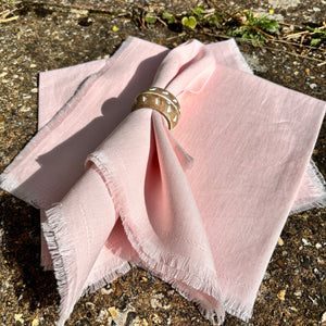 blush pink fringed napkins for wedding tableware hire