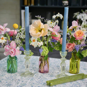 coloured vases, green candlesticks, coloured candles