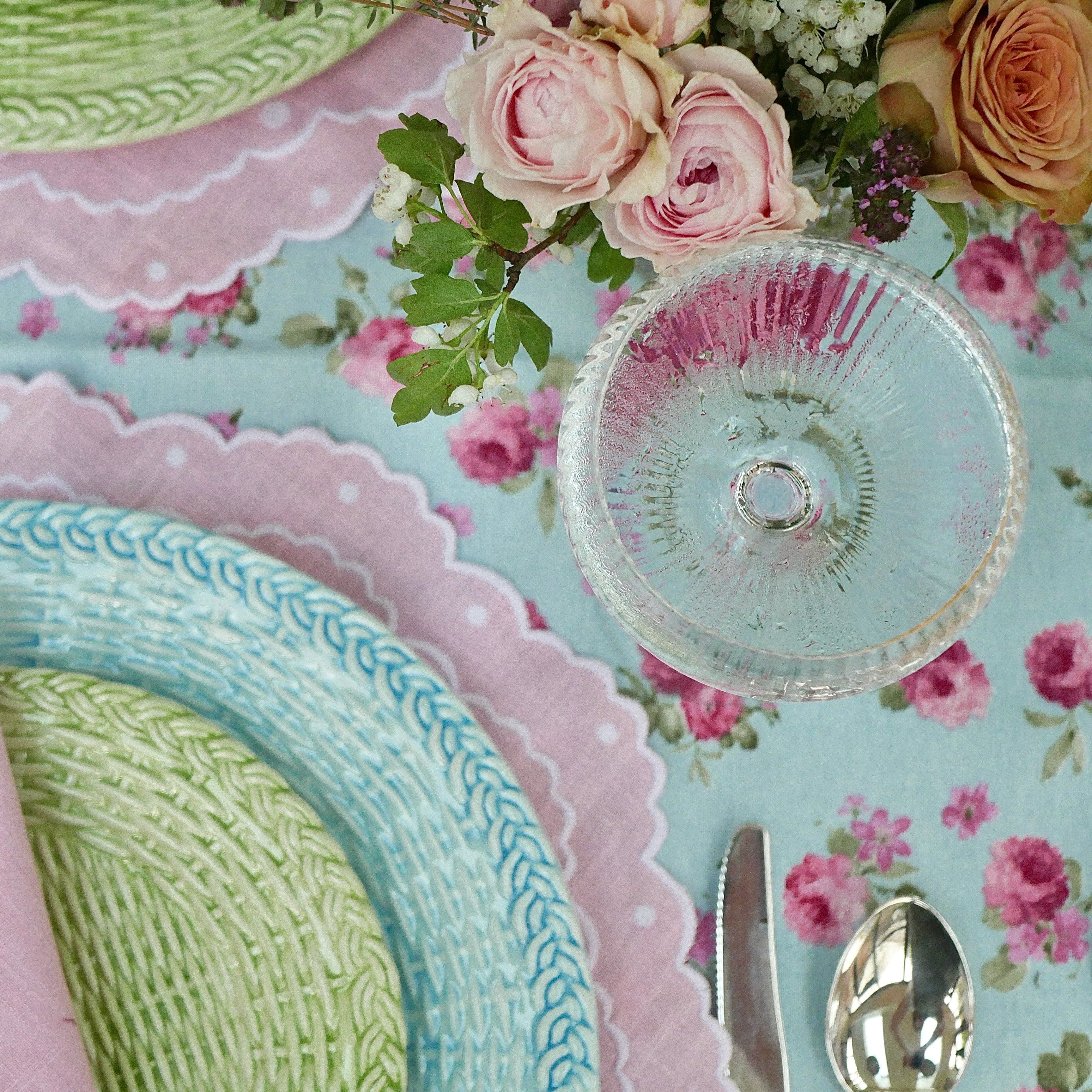 Scalloped pink tablemat