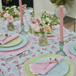 Load image into Gallery viewer, Summer Tablescape wicker plates, cut glass candlesticks, rosebud tablecloth
