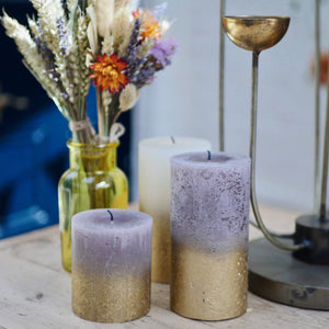 grey and gold pillar candles