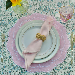 pink scalloped placemat