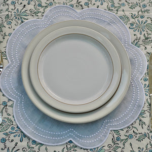 blue scalloped placemat and napkin